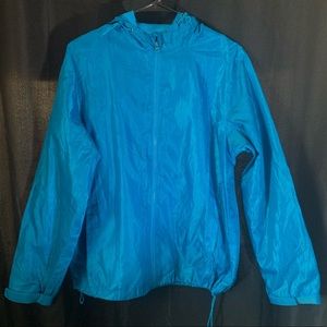 Bright blue windbreaker with drawstrings